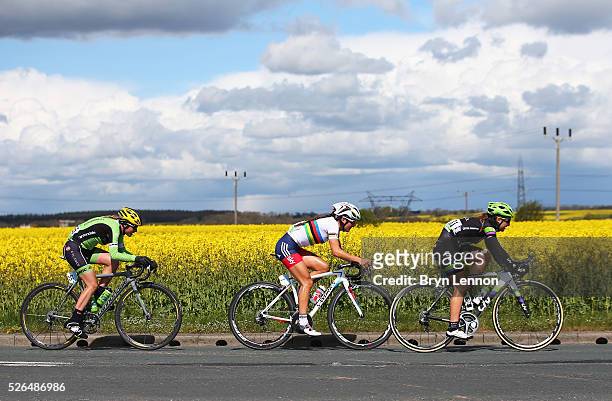 Leah Kirchmann of Team Liv-Plantur and Canada competes with Lizzie Armitstead of the Great Britain National Team and Doris Schweizer of Cyclance Pro...