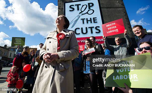 Scottish Labour leader Kezia Dugdale poses as she unveils a new election campaign poster on Leith Walk in Edinburgh on April 30, 2015. Scotland will...