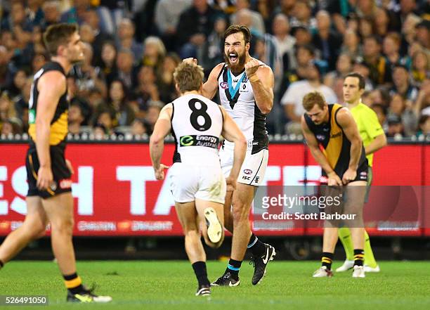 Charlie Dixon of the Power celebrates after kicking a goal during the round six AFL match between the Richmond Tigers and the Port Adelaide Power at...