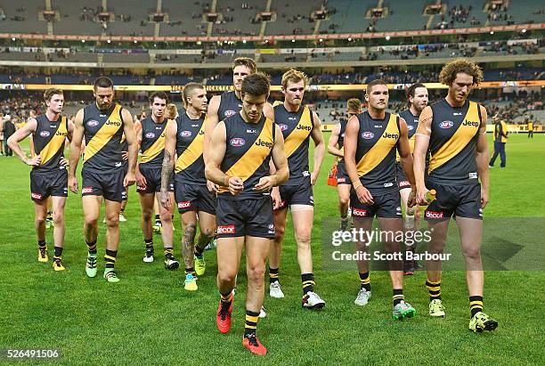 Trent Cotchin and the Tigers leave the field at full time after losing the round six AFL match between the Richmond Tigers and the Port Adelaide...