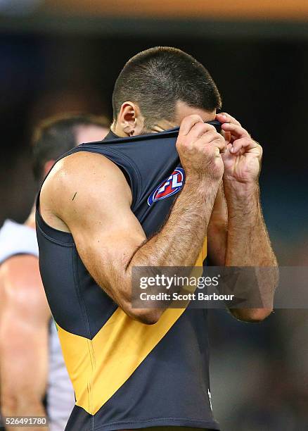 Troy Chaplin of the Tigers reacts at full time after losing the round six AFL match between the Richmond Tigers and the Port Adelaide Power at...