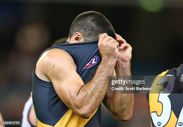 Troy Chaplin of the Tigers reacts at full time after losing the round six AFL match between the Richmond Tigers and the Port Adelaide Power at...