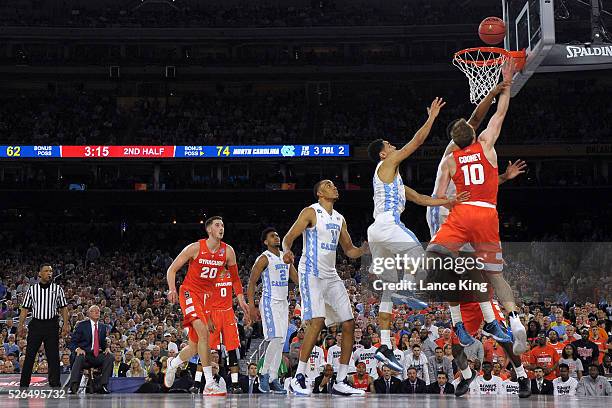 Trevor Cooney of the Syracuse Orange goes to the basket against the North Carolina Tar Heels during the 2016 NCAA Men's Final Four Semifinal at NRG...