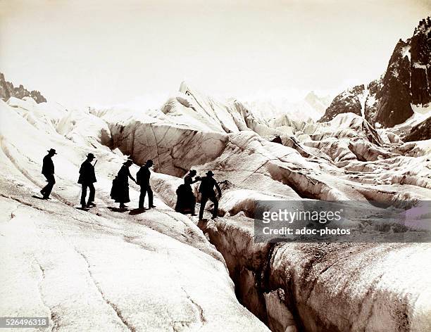 Crossing of the Mer de Glace in the Mont Blanc Massif . Ca. 1900.
