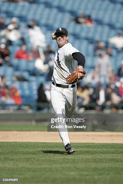 Third baseman Joe Crede of the Chicago White Sox throws to first base during the game against the Cleveland Indians at U.S. Cellular Field on April...