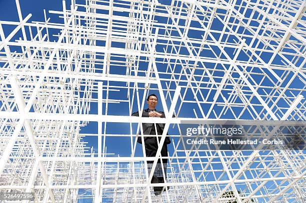 Sou Fujimoto attends a photo call for the new Serpentine Pavilion at the Serpentine Gallery.