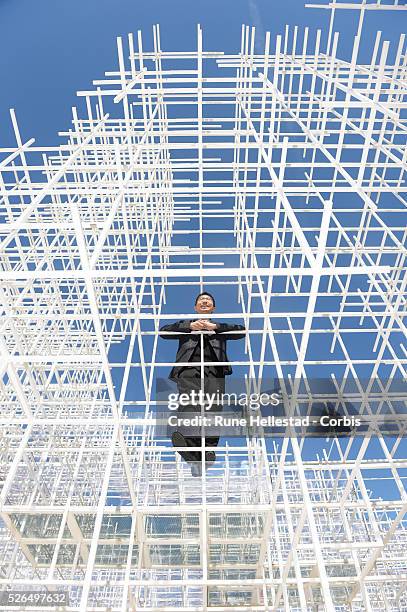 Sou Fujimoto attends a photo call for the new Serpentine Pavilion at the Serpentine Gallery.