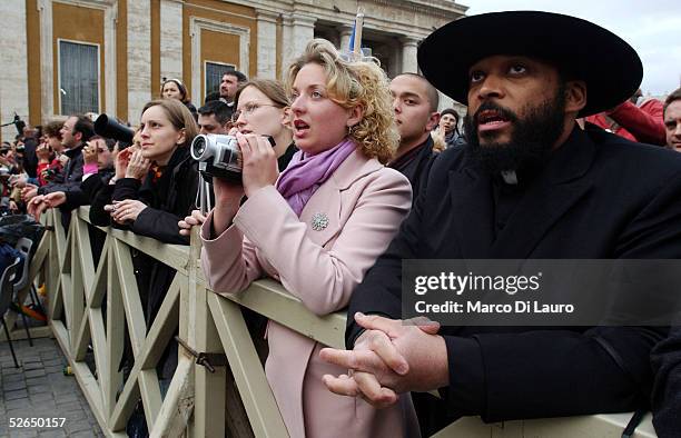 The crowd waits for the announcement of the name of the new pope after white smoke rose from the Sistine Chapel signaling a pope had been elected...