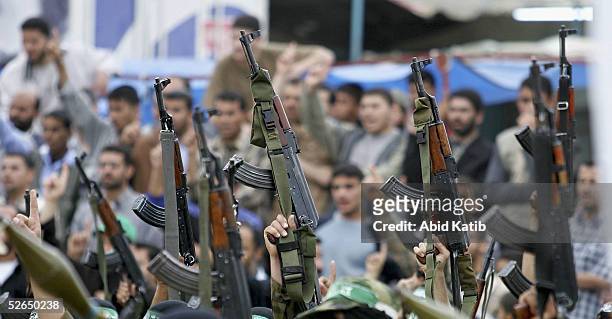 military wing of hamas hold rally before start of election campaigns - militia stock pictures, royalty-free photos & images