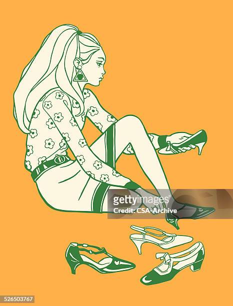 frau versucht auf schuhe - girl shoes stock-grafiken, -clipart, -cartoons und -symbole