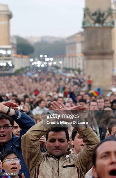 The crowd reacts as German Cardinal Joseph Ratzinger appears on the balcony of St.Peter's Cathedral as Pope Benedict XVI at the end of the second day...