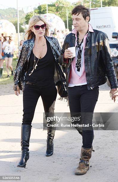 Kate Moss and Jamie Hince at the Glastonbury Festival.