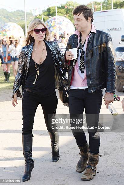 Kate Moss and Jamie Hince at the Glastonbury Festival.