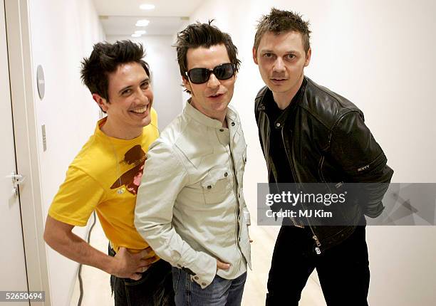 Javier Weyler, Kelly Jones and Richard Jones of Welsh rock trio Stereophonics pose at their intimate gig launching a series of events due to take...