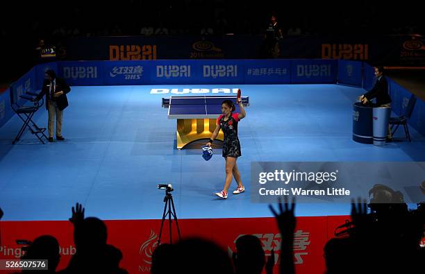 Liu Shiwen of China celebrates beating Li Xiaoxia of China during the Women's singles final of the Nakheel Table Tennis Asian Cup 2016 at Dubai World...