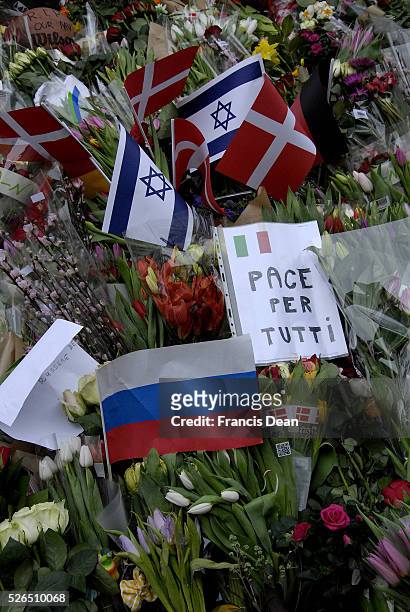 Copenhagen-Denamrk _Hundres of people lying flwoers bouquites and ��aying respect at krystalgade jews snynogogue where 2,dn man was shot and 3 police...