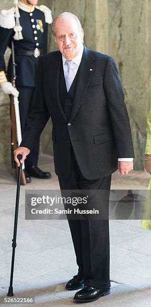 King Juan Carlos of Spain arrives at the Royal Palace to attend Te Deum Thanksgiving Service to celebrate the 70th birthday of King Carl Gustaf of...