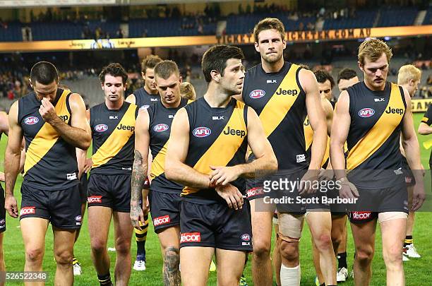 Trent Cotchin and the Tigers leave the field at full time after losing the round six AFL match between the Richmond Tigers and the Port Adelaide...