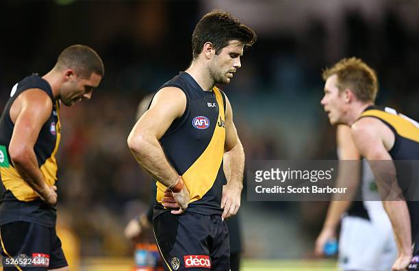 Trent Cotchin and Jack Riewoldt of the Tigers react at full time after losing the round six AFL match between the Richmond Tigers and the Port...