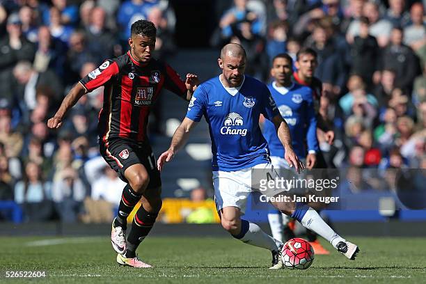 Darron Gibson of Everton and Joshua King of Bournemouth compete for the ball during the Barclays Premier League match between Everton and A.F.C....