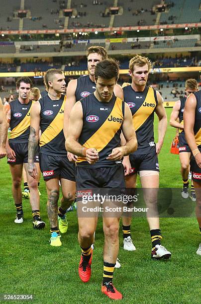 Trent Cotchin and the Tigers leave the field at full time after losing the round six AFL match between the Richmond Tigers and the Port Adelaide...