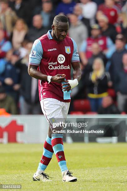 Aly Cissokho of Aston Villa walks off the pitch after receiving the red card during the Barclays Premier League match between Watford and Aston Villa...
