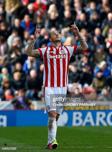 Stoke City's Austrian striker Marko Arnautovic celebrates scoring the opening goal during the English Premier League football match between Stoke...