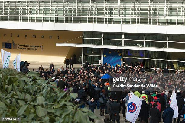 February 2013 Staff in the EU Council joined a strike in front of the commission's main building :Berlaymont against cuts and commission wages. In a...