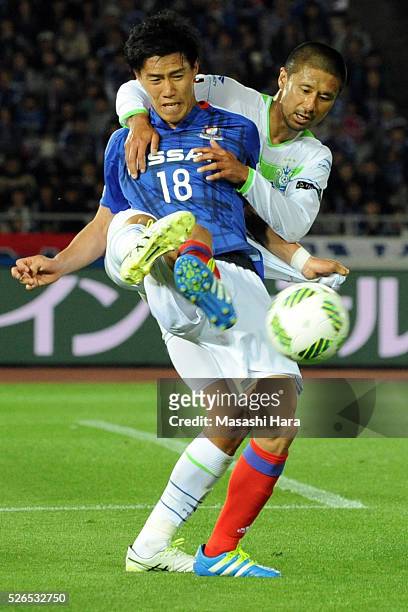 Keita Endo of Yokohama F.Marinos and Keisuke Tsuboi of Shonan Bellmare compete for the ball during the J.League match between Yokohama F.Marinos and...