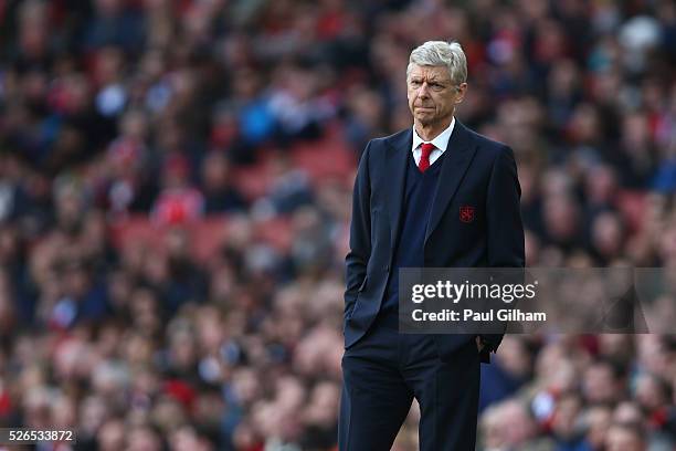 Arsene Wenger Manager of Arsenal looks on during the Barclays Premier League match between Arsenal and Norwich City at The Emirates Stadium on April...