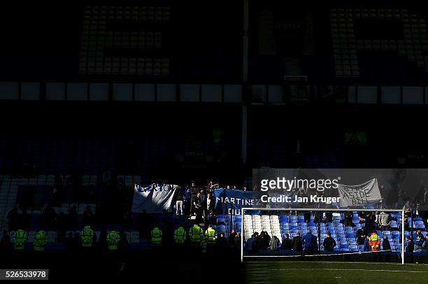 Fans protest after the Barclays Premier League match between Everton and A.F.C. Bournemouth at Goodison Park on April 30, 2016 in Liverpool, England.