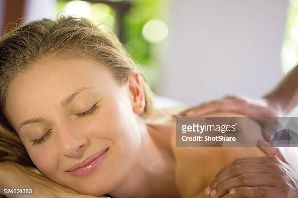 woman relaxing on massage - close eyes stock pictures, royalty-free photos & images