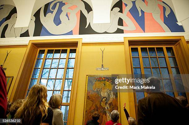 Tour guide leads visitors on a tour of the Barnes Foundation in Philadelphia, PA on December 26, 2012. The collection of more than 2,500 objects,...