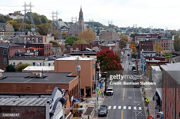 view on manayunk main street in philadelphia - philadelphia pennsylvania stock pictures, royalty-free photos & images