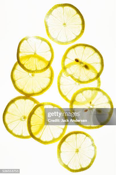 lemon on white - lemon slices fotografías e imágenes de stock