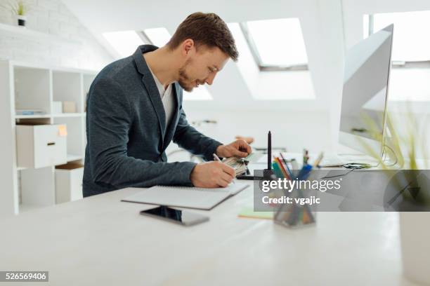 graphic designer at work. - graphic design studio stock pictures, royalty-free photos & images