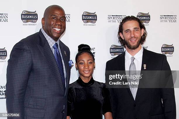 Earvin 'Magic' Johnson, Mo'Ne Davis and Madison Bumgarner attend the "2014 Sports Illustrated Sportsman Of The Year Award Presentation" at Pier 60 in...