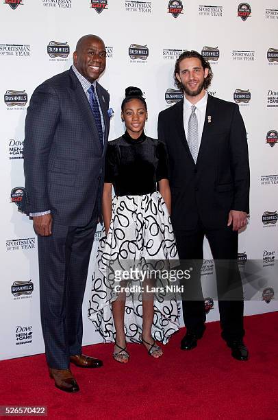 Earvin 'Magic' Johnson, Mo'Ne Davis and Madison Bumgarner attend the "2014 Sports Illustrated Sportsman Of The Year Award Presentation" at Pier 60 in...
