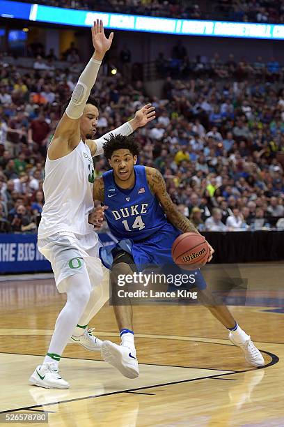 Brandon Ingram of the Duke Blue Devils drives against Dillon Brooks of the Oregon Ducks during the West Regional Semifinal of the 2016 NCAA Men's...