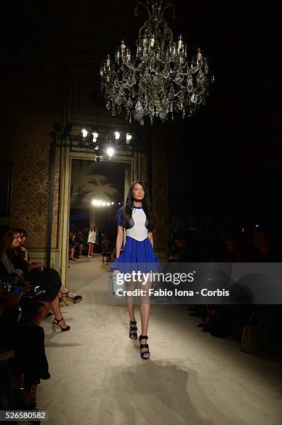 Model walks the runway during the Fay show as a part of Milan Fashion Week Womenswear Spring/Summer 2014 on September 18, 2013 in Milan, Italy