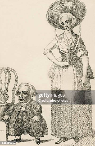 Engraving depicting Dutch jeweller and watchmaker Wybrand Lolkes and his wife, circa 1790. Lolkes, who suffered from dwarfism, was also an exhibit at...