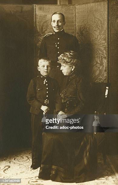King Alfonso XIII of Spain , Maria Christina of Austria Queen of Spain, mother of the King , and also the young Alfonso, Prince of Asturias , first...