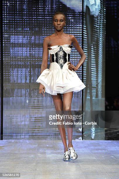 Model walks the runway at the Philipp Plein Event - Milan Fashion Week Womenswear Spring/Summer 2014 at Piazza Vetra on September 21, 2013 in Milan,...