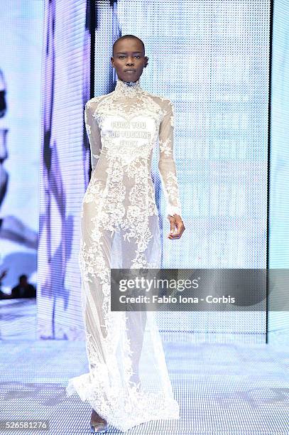 Model walks the runway at the Philipp Plein Event - Milan Fashion Week Womenswear Spring/Summer 2014 at Piazza Vetra on September 21, 2013 in Milan,...