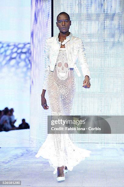 Model walks the runway at the Philipp Plein Event - Milan Fashion Week Womenswear Spring/Summer 2014 at Piazza Vetra on September 21, 2013 in Milan,...