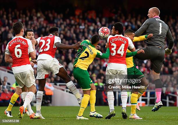 John Ruddy of Norwich City jumps for a header in the Arsenal penalty box during the Barclays Premier League match between Arsenal and Norwich City at...