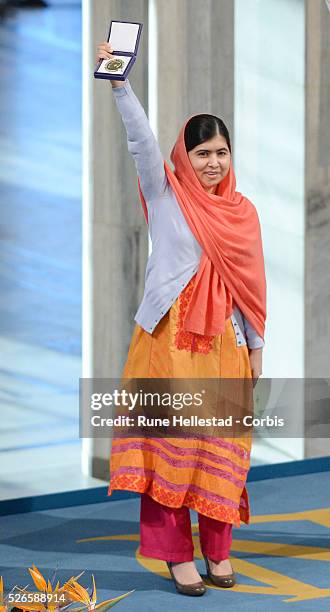 Malala Yousafzai and Kailash Satyarthi attend the Nobel Peace Prize ceremony at the City Hall in Oslo.