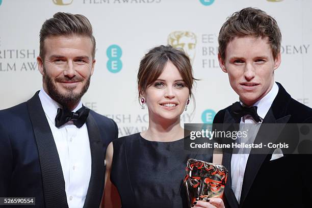 David Beckham, Felicity Jones and Eddie Redmayne attend the Winner's Room at the EE British Academy Film Awards at the Royal Opera House.