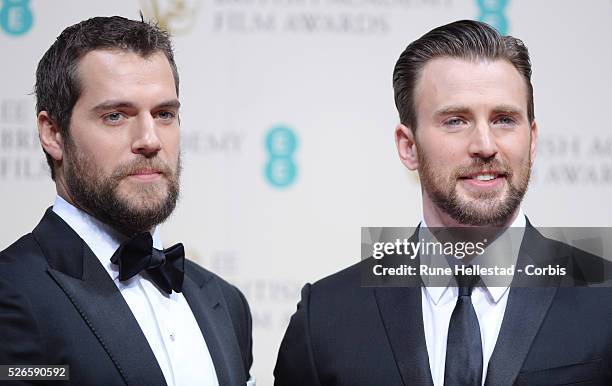 Henry Cavill and Chris Evans attend the Winner's Room at the EE British Academy Film Awards at the Royal Opera House.