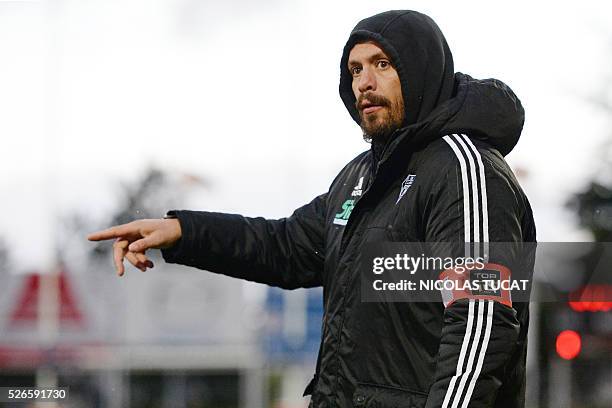 Brive Rugby Union Club's French Head Coach Nicolas Godignon gestures during the French Top 14 rugby union match between Agen and Brive on April 30,...